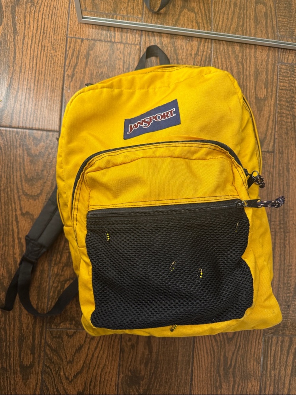 Jansport Yellow Backpack with Black Mesh Front Pocket